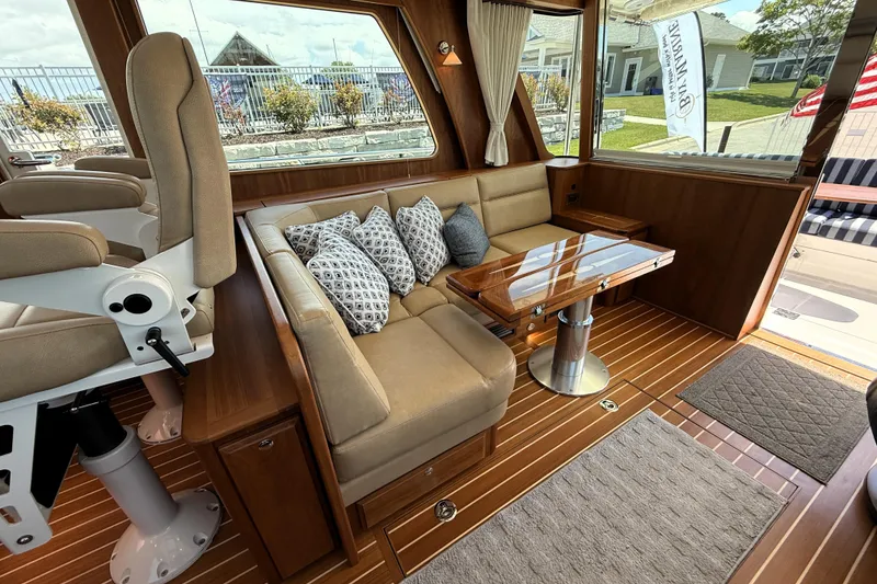Slide: The Image of Luxurious interior of 2022 Sabre 48 Salon Express yacht with plush seating and elegant wood finishes. - 17