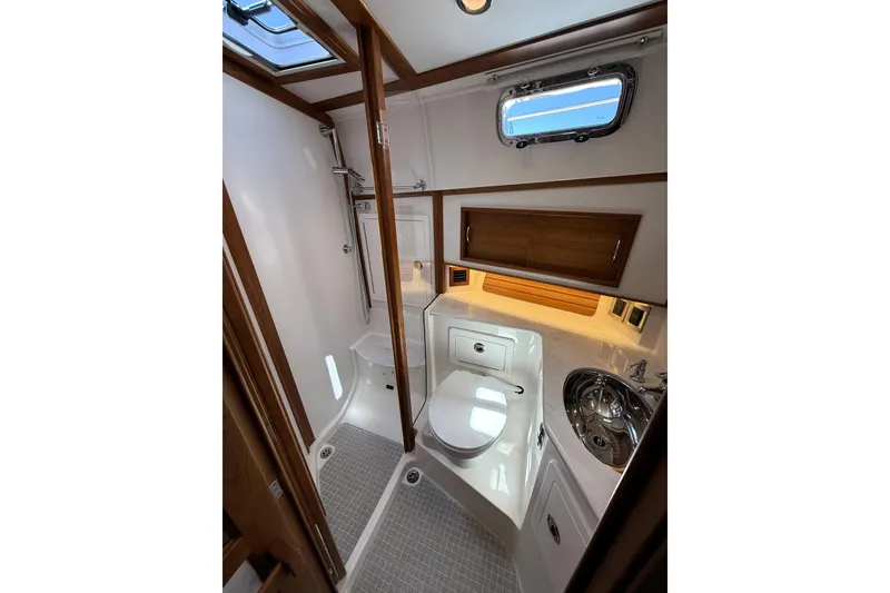 Slide: The Image of Modern bathroom interior of 2022 Sabre 48 Salon Express yacht, featuring shower and sink. - 37