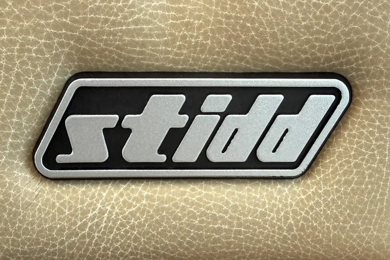 Slide: The Image of Stidd logo on Sabre 48 Salon Express 2022 leather interior. - 26
