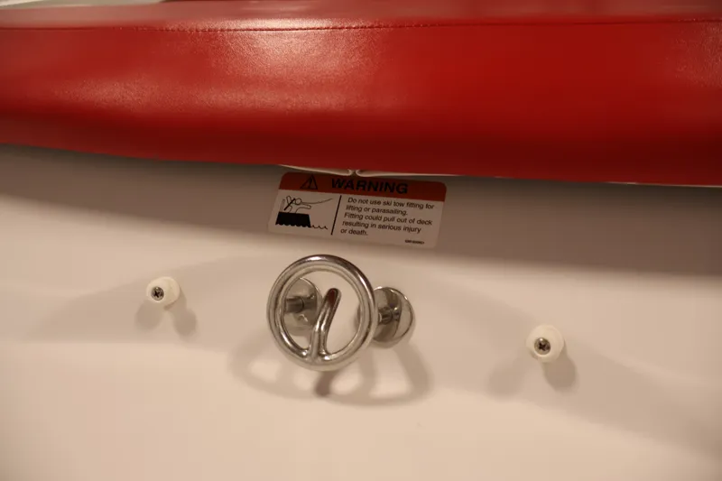 Slide: The Image of Red and white interior of 2009 Four Winns H180 boat with warning label. - 35