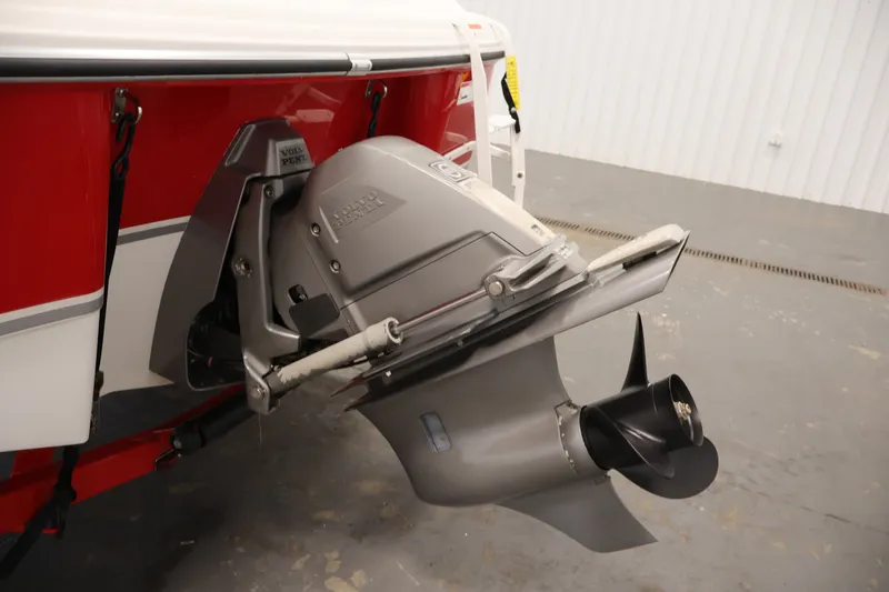 Slide: The Image of 2009 Four Winns H180 boat with Volvo Penta outdrive, red and white exterior. - 38