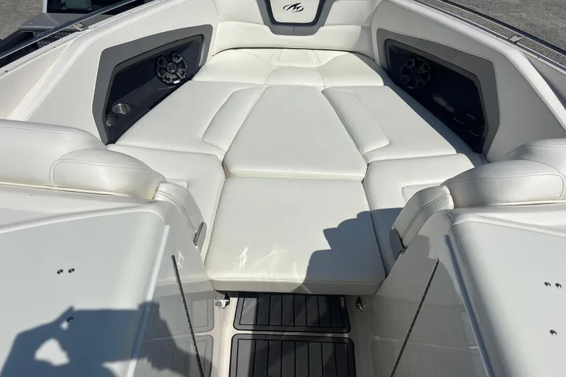 Slide: The Image of 2014 Monterey 328SS Super Sport boat interior with white seating and speaker system. - 29