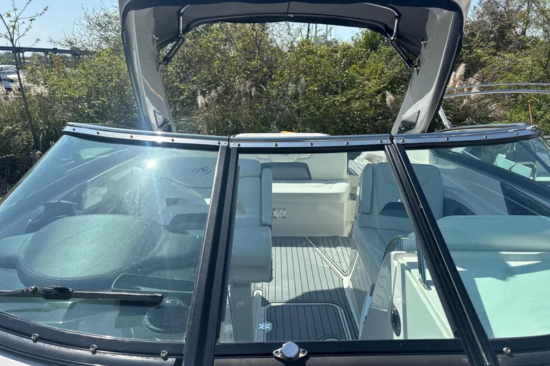 Slide: The Image of 2014 Monterey 328SS Super Sport boat interior with seating and windshield view. - 31