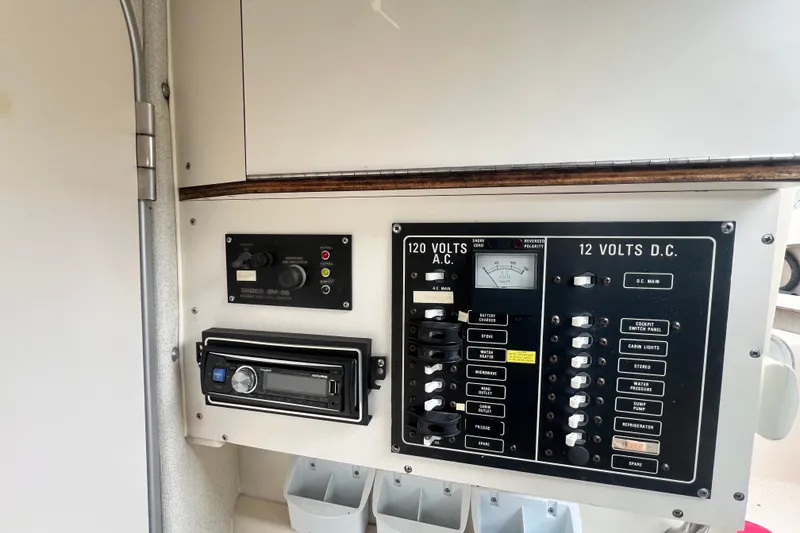 Slide: The Image of Electrical control panel on a 1996 Grady-White Marlin 300 boat. - 13