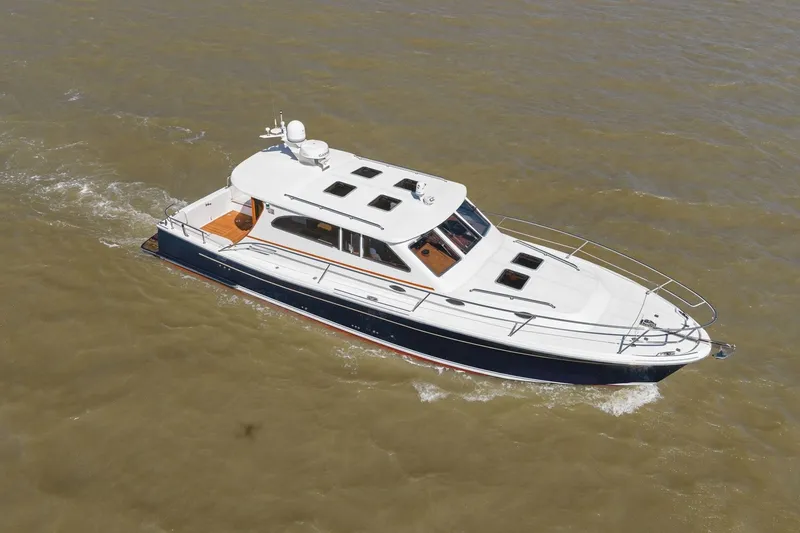 Slide: The Image of Aerial view of 2009 Rivolta Coupe 4.5 yacht cruising on water. - 23