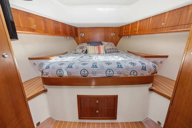 Slide: The Image of Luxurious 2009 Rivolta Coupe 4.5 cabin interior with cozy bed and wooden accents. - 50