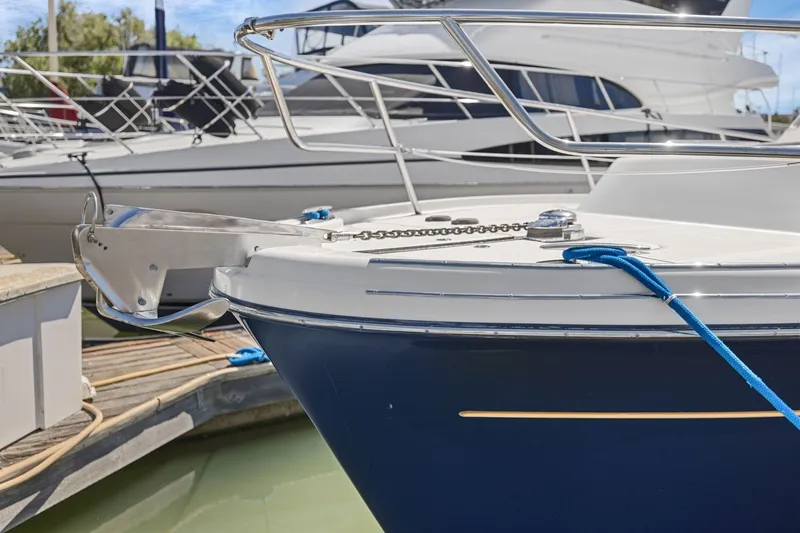 Slide: The Image of Close-up of a 2009 Rivolta Coupe 4.5 yacht bow with anchor and blue rope. - 65