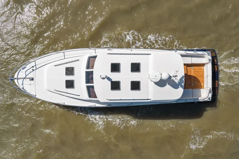 Slide: The Image of Aerial view of 2009 Rivolta Coupe 4.5 yacht cruising on water. - 25