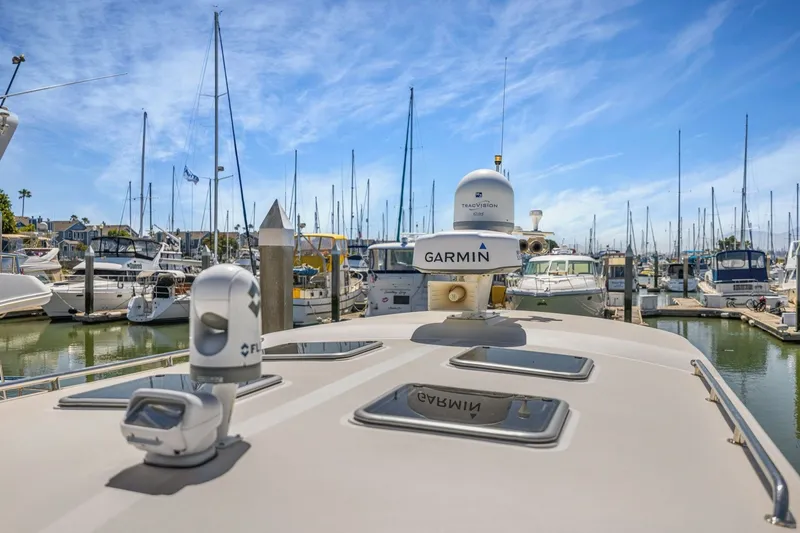 Slide: The Image of Marina view with boats and Garmin equipment on a Rivolta Coupe 4.5, 2009 model. - 58