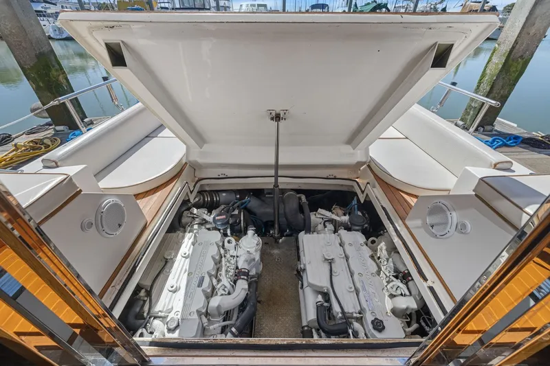 Slide: The Image of Open engine compartment of 2009 Rivolta Coupe 4.5 boat, docked at marina. - 67