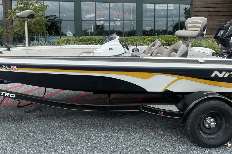 Slide: The Image of 2008 Nitro Z-7 boat with sleek design, parked outdoors on a trailer. - 1