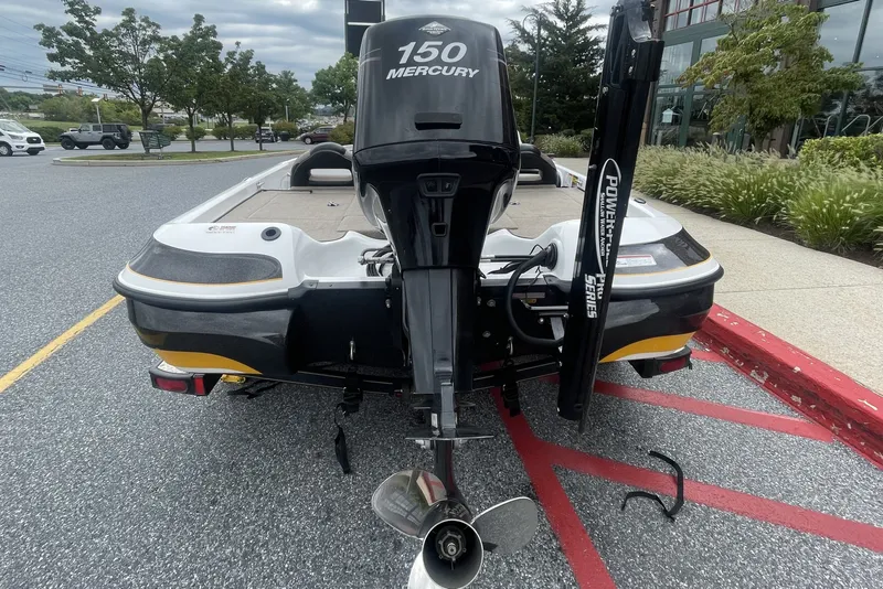 Slide: The Image of 2008 Nitro Z-7 boat with Mercury 150 engine in parking lot. - 4