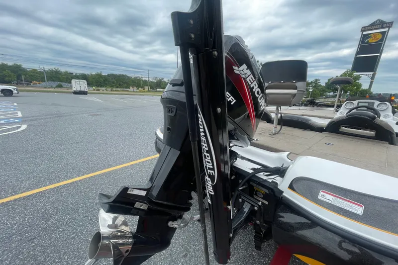 Slide: The Image of 2008 Nitro Z-7 boat with Mercury engine and Power-Pole Pro anchor in parking lot. - 14