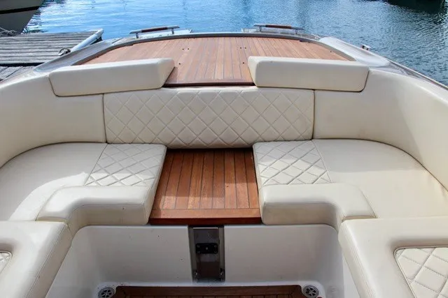 Slide: The Image of Luxurious seating on 2013 Chris-Craft Corsair 32 boat with quilted upholstery. - 12