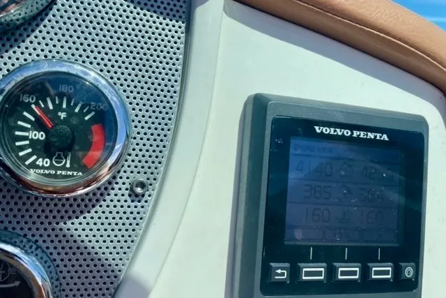 Slide: The Image of Dashboard of a 2013 Chris-Craft Corsair 32 with Volvo Penta gauges. - 13