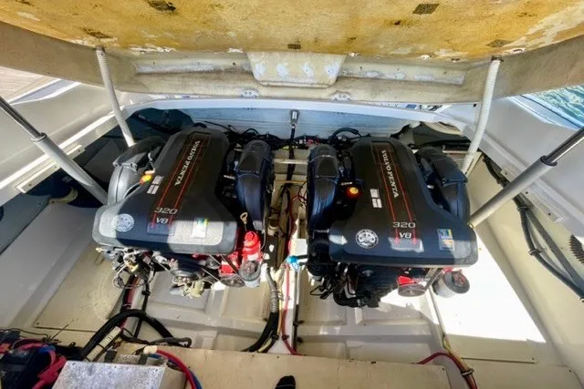 Slide: The Image of 2013 Chris-Craft Corsair 32 engine compartment with twin V8 engines. - 18
