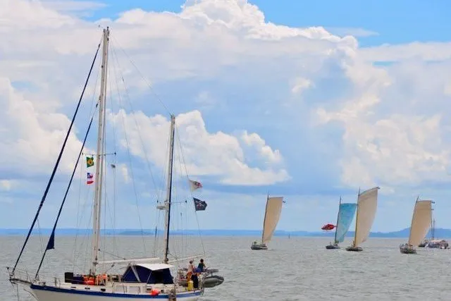 Slide: The Image of Sailboats on calm sea under cloudy sky, featuring a 1977 Down East Yachts DownEaster 45. - 4