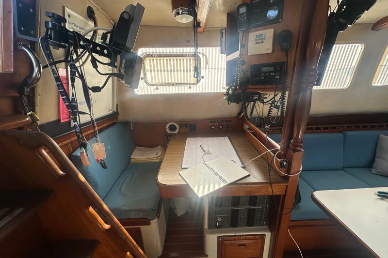 Slide: The Image of Interior of a 1977 Down East Yachts DownEaster 45 sailboat with navigation equipment. - 22
