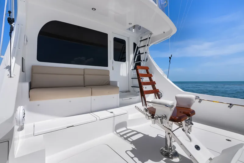 Slide: The Image of Luxurious 2017 Hatteras GT54 yacht deck with seating and ocean view. - 33