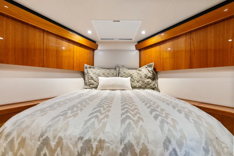 Slide: The Image of Luxurious cabin interior of 2017 Hatteras GT54 yacht with elegant wood finishes. - 67