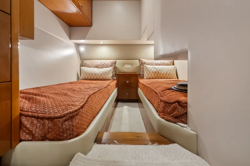 Slide: The Image of Luxurious twin cabin interior of 2017 Hatteras GT54 yacht with elegant bedding. - 60
