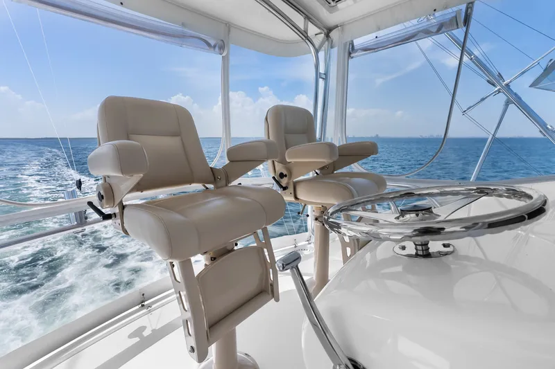Slide: The Image of Luxurious helm seating on 2017 Hatteras GT54 yacht with ocean view. - 28