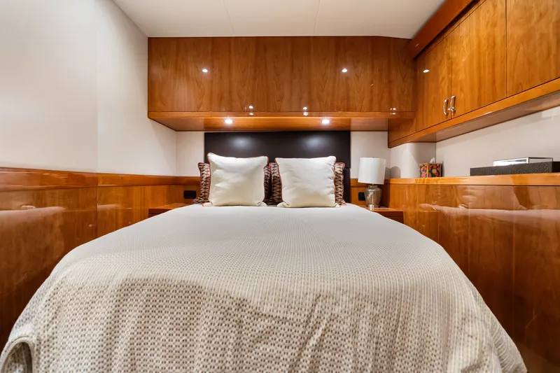 Slide: The Image of Luxurious cabin interior of 2017 Hatteras GT54 yacht with elegant wood finish. - 52