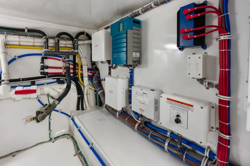 Slide: The Image of Electrical system of a 2017 Hatteras GT54 yacht, showcasing wiring and components. - 87