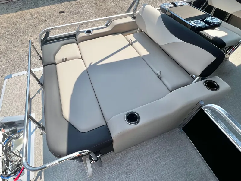 Slide: The Image of The image shows a luxurious lounge area on a boat with cup holders and sleek upholstery. - 17