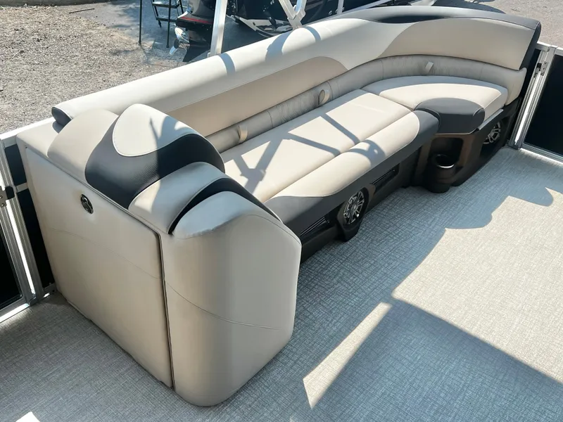 Slide: The Image of The image shows a sleek, beige upholstered seating area on a boat, featuring modern design elements. - 26
