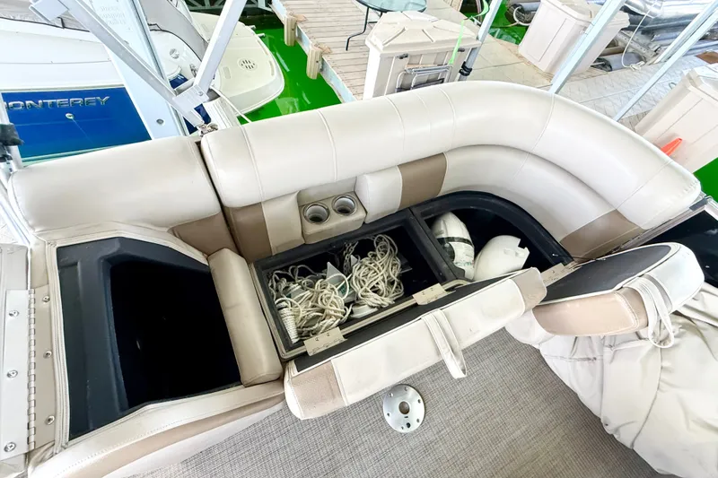 Slide: The Image of 2017 Bentley Pontoons 223 Elite Cruise interior storage with ropes and life jackets. - 24