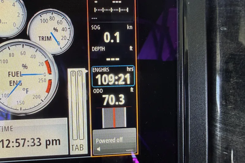 Slide: The Image of Dashboard of a 2017 Bentley Pontoons 223 Elite Cruise showing engine hours and odometer. - 28