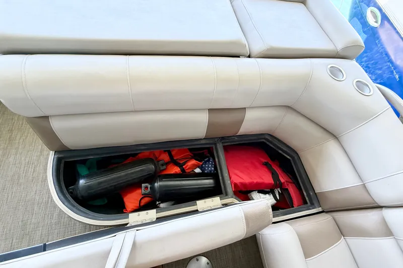 Slide: The Image of 2017 Bentley Pontoons 223 Elite Cruise storage with life jackets and boat fenders. - 27