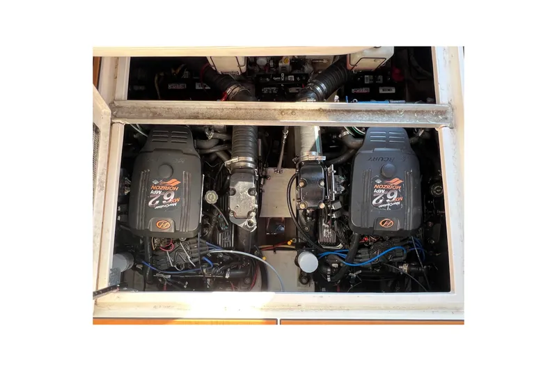Slide: The Image of 2003 Cruisers Yachts 3372 Express engine compartment with twin MerCruiser engines. - 16