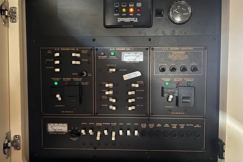 Slide: The Image of Electrical control panel of a 2003 Cruisers Yachts 3372 Express boat. - 40