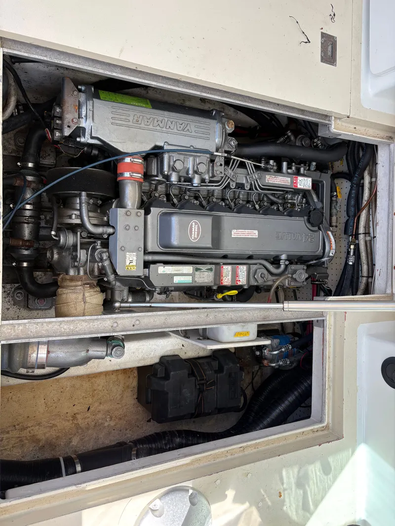 Slide: The Image of A Yanmar engine is installed in a boat. It appears clean and well-maintained. - 26