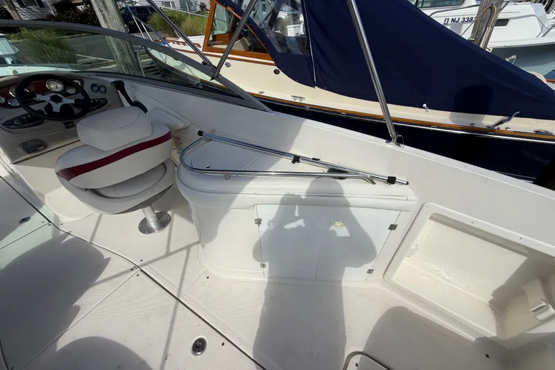 Slide: The Image of 2006 Monterey 248LS Montura Bowrider interior with steering wheel and seating area. - 20