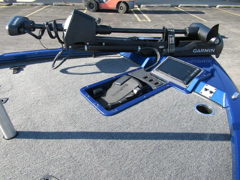 Slide: The Image of The image shows the deck of a Vexus AVX 1980 boat with a Garmin trolling motor and control unit. - 6