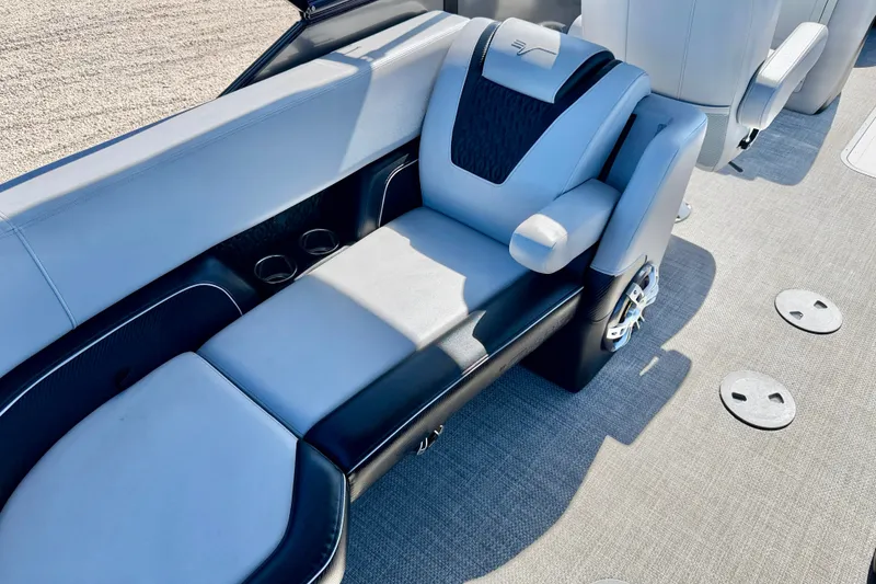 Slide: The Image of Luxurious seating in a 2027 Vanderbilt 23QS boat, featuring sleek design and comfortable upholstery. - 17