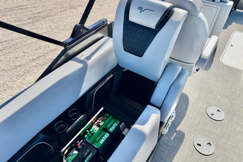 Slide: The Image of 2027 Vanderbilt 23QS boat interior with luxurious seating and integrated battery storage. - 30