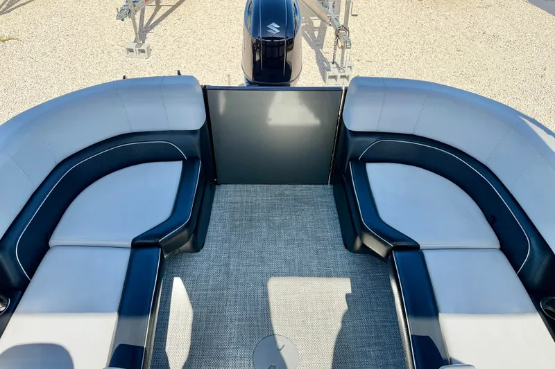 Slide: The Image of Luxurious seating on a 2027 Vanderbilt 23QS boat with modern design and comfort. - 18