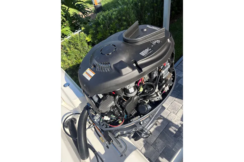 Slide: The Image of 2027 Key West 179 FS boat engine, detailed view, showcasing internal components. - 14