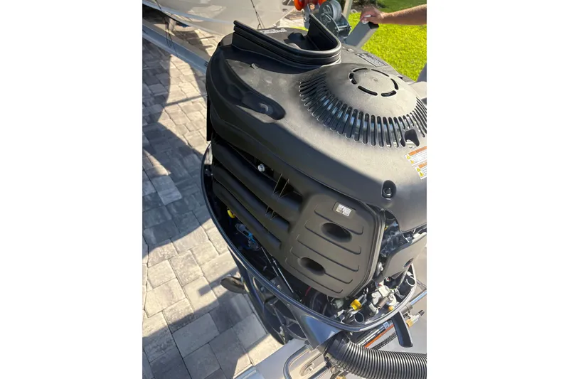 Slide: The Image of 2027 Key West 179 FS boat engine, detailed view of the motor components. - 15