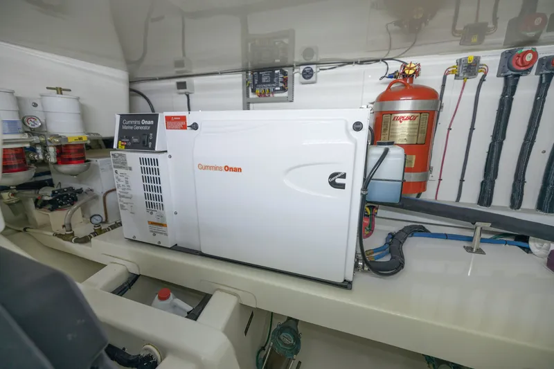 Slide: The Image of Cummins Onan marine generator in 2010 Grand Banks 41 Heritage EU engine room. - 36