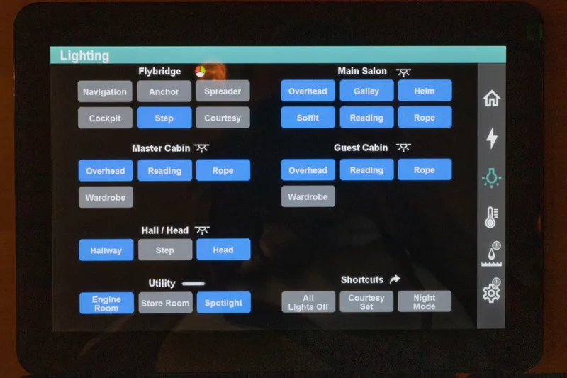 Slide: The Image of Touchscreen lighting control panel for 2010 Grand Banks 41 Heritage EU yacht, displaying various cabin options. - 16