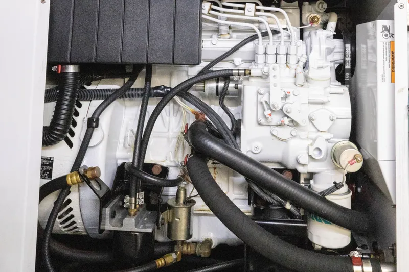 Slide: The Image of Engine compartment of 2010 Grand Banks 41 Heritage EU yacht, showcasing detailed mechanical components. - 39