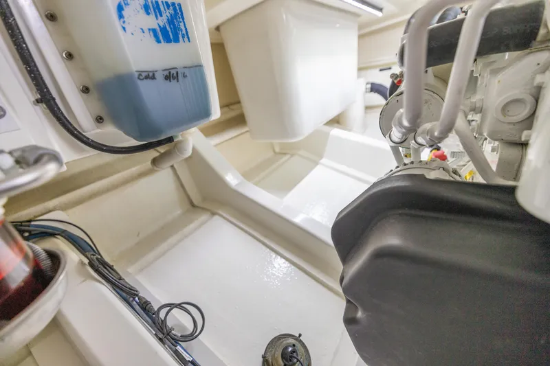 Slide: The Image of Engine room of 2010 Grand Banks 41 Heritage EU yacht, showcasing mechanical components and systems. - 37