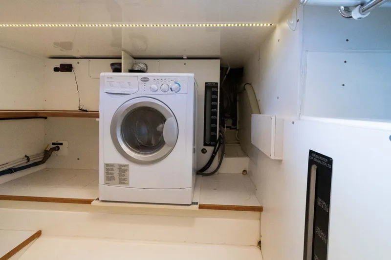 Slide: The Image of Laundry area with washing machine on 2010 Grand Banks 41 Heritage EU yacht. - 33