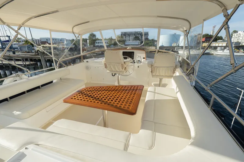 Slide: The Image of Flybridge of 2010 Grand Banks 41 Heritage EU yacht with seating and helm station. - 27