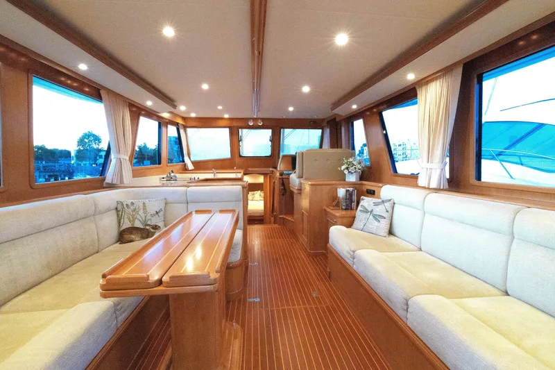 Slide: The Image of Luxurious interior of 2010 Grand Banks 41 Heritage EU yacht with elegant wood finish. - 48